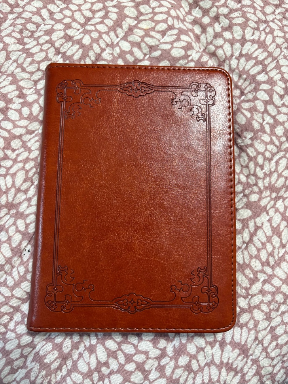 Fintie brand brown vegan leather case designed for the Kindle Paperwhite